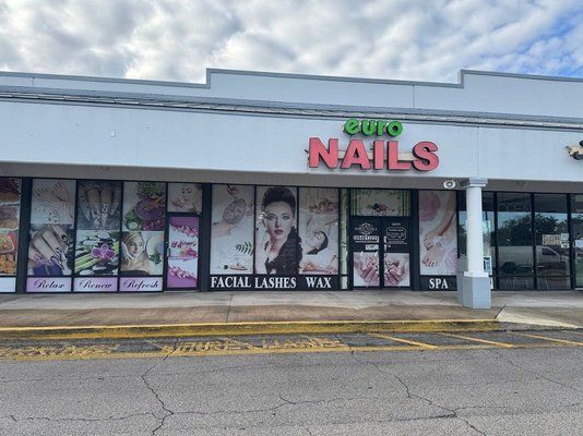 Outside Euro Nail Lounge — wide view of the storefront and parking at 870 Saxon Blvd, Orange City