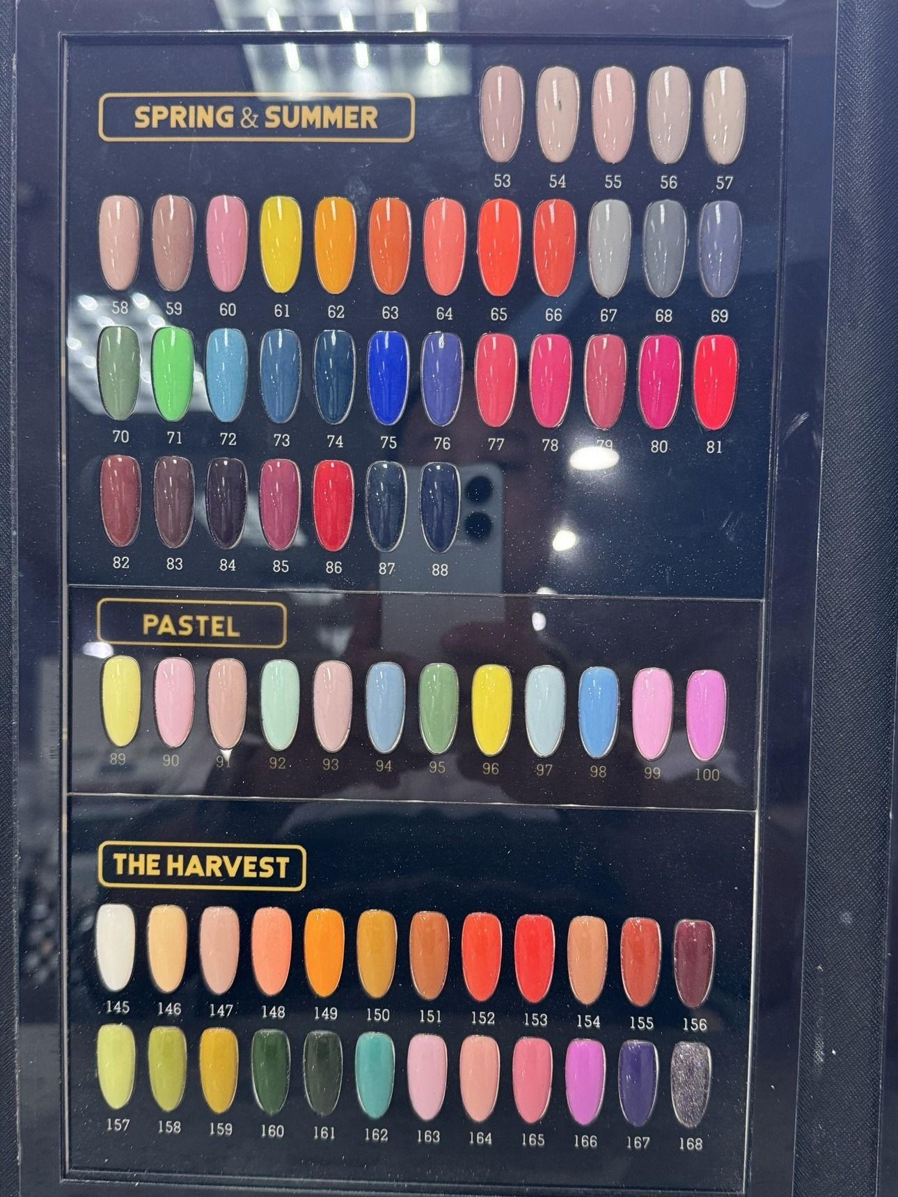 Solid Colors gel polish chart — Spring and Summer shades 53 to 88, Pastel shades 89 to 100, and The Harvest shades 145 to 168