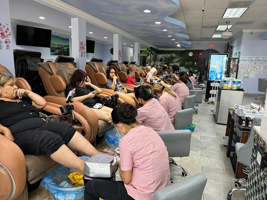 Inside Euro Nail Lounge — rows of pedicure spa massage chairs with guests getting pedicures